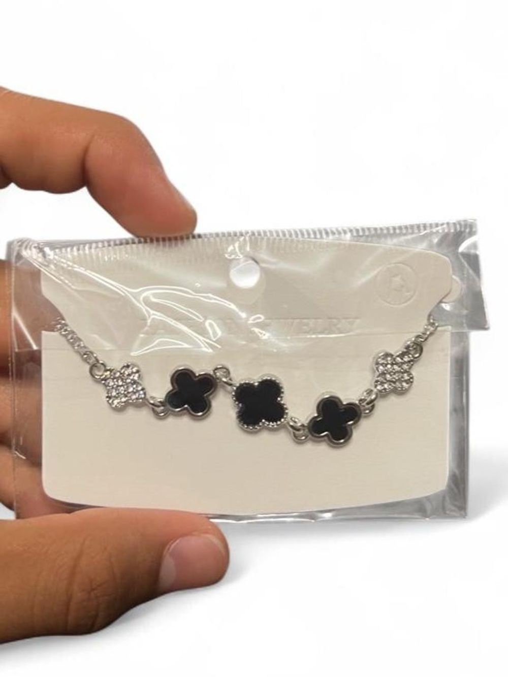 Silver Tone Clover Link Bracelet with Black Enamel and Crystal Accents